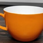 Orange cappuccino cup